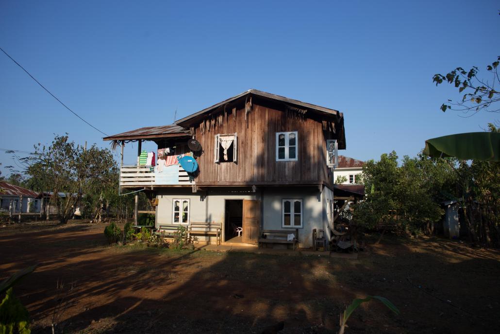 An example of one of the homes provided to villagers who have been displaced by the Myitsone project. (Mark Inkey | Frontier)