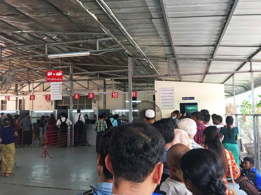 At the passport office in Yangon, where Burmese Muslims and people of South Asian and Chinese descent – whom officials classify as being of “mixed-blood” – must form a separate queue and receive greater scrutiny. (Than Toe Aung | Frontier)