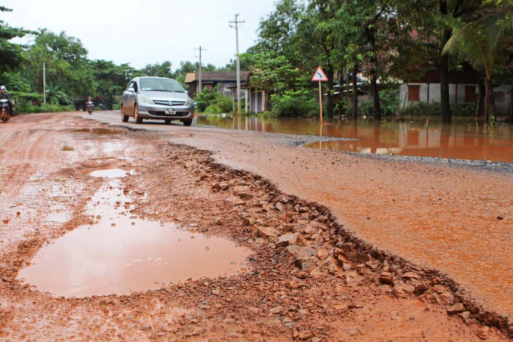 The halt to construction work on the highway meant drivers endured terrible conditions throughout the monsoon. (Thomas Kean | Frontier)