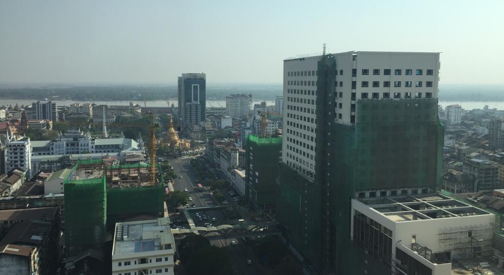 ရန်ကုန်မြို့လယ်တွင် Sule Square ရုံးခန်းအဆောက်အအုံ တည်ဆောက်ပြီးစီးနေမှုကို ပြီးခဲ့သည့် ရက်သတ္တပတ်က တွေ့ရစဉ်။ ဓာတ်ပုံ- ဆန်းဦး