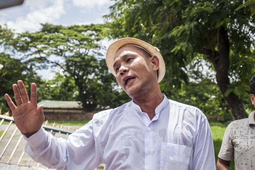 U Michael Kyaw Myint speaks to press in Tarmwe on Friday. (Theint Mon Soe aka J | Frontier)
