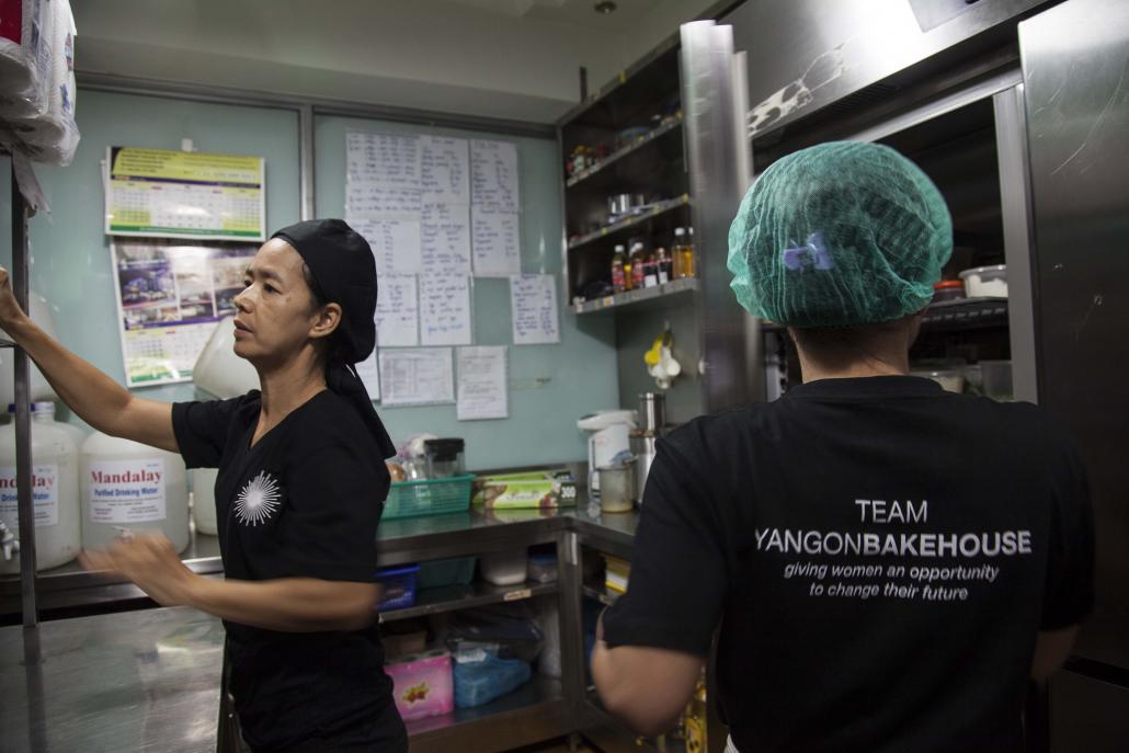 Staff from the Yangon Bakehouse prepare food. (Theint Mon Soe / Frontier)