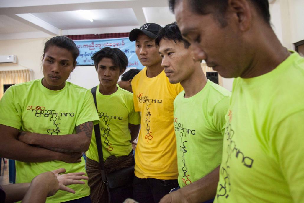 Former trafficking victims take part in an event in Yangon's Ahlone Township to mark Anti-Trafficking in Persons Day on September 13. The men were trafficked to a range of countries, including Thailand and Indonesia. (Theint Mon Soe — J / Frontier)