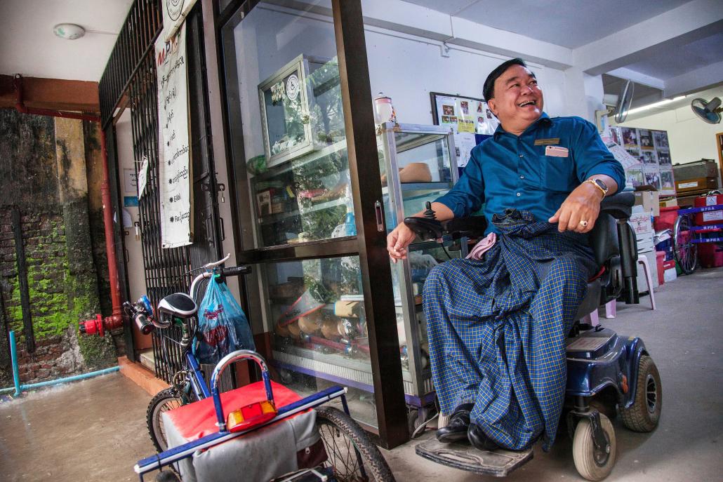 Aye Ko Ko, general secretary of the Myanmar Physically Handicapped Association, at the group’s office in Yangon on July 14. (Theint Mon Soe / Frontier)