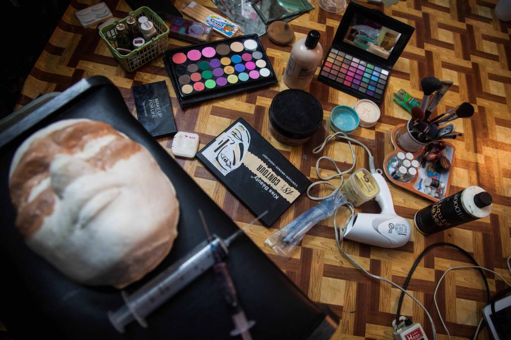 Make up boxes and accessories on display. (Theint Mon Soe - J / Frontier)