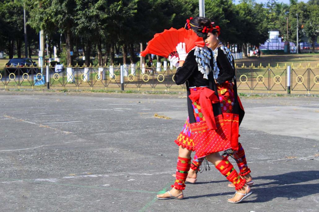 Kachin youth at a dance practice session in Kachin National Manau Park in preparation for Kachin State Day. (Emily Fishbein | Frontier)