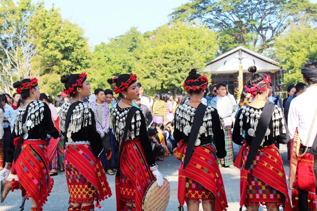 Kachin youth rehearse dances in the Kachin National Manau Park in December to prepare for Kachin State Day. (Emily Fishbein | Frontier)