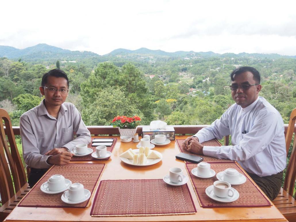 U Khin Maung Chin (right), chairman of the newly formed Kalaw Tourism Organisation and the organisation's secretary U Kyaw Soe Han at the Hill Top Villa Hotel. (Ben Dunant | Frontier)