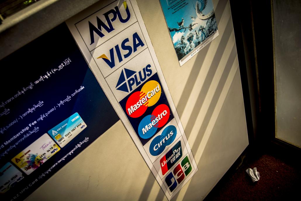 Myanmar Payment Union launched in 2011, and began issuing debit cards the following year. It now has around 1.8 million cards in circulation. (Maro Verli / Frontier)