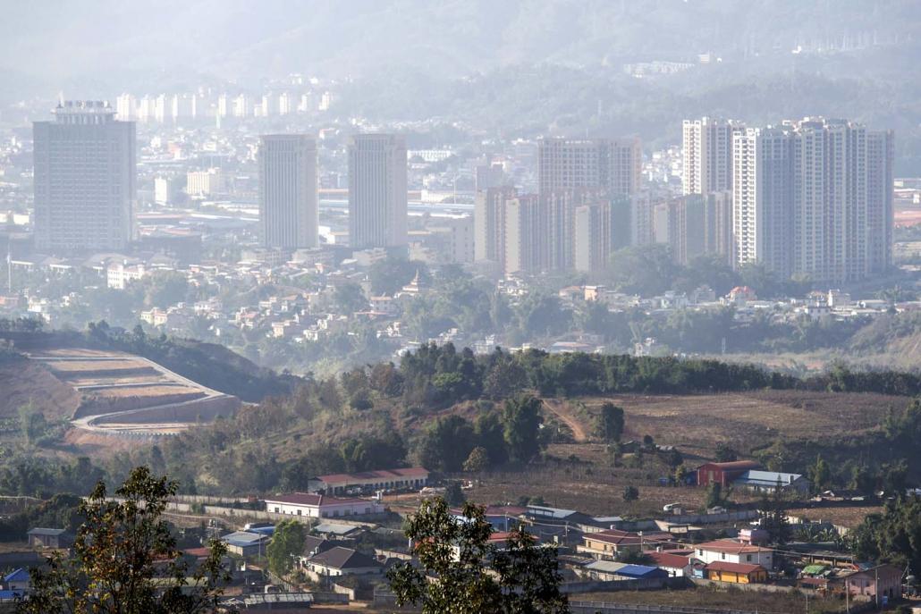 The town of Muse (foreground) on the border with China is home to numerous unlicensed casinos run by armed groups. (AFP)