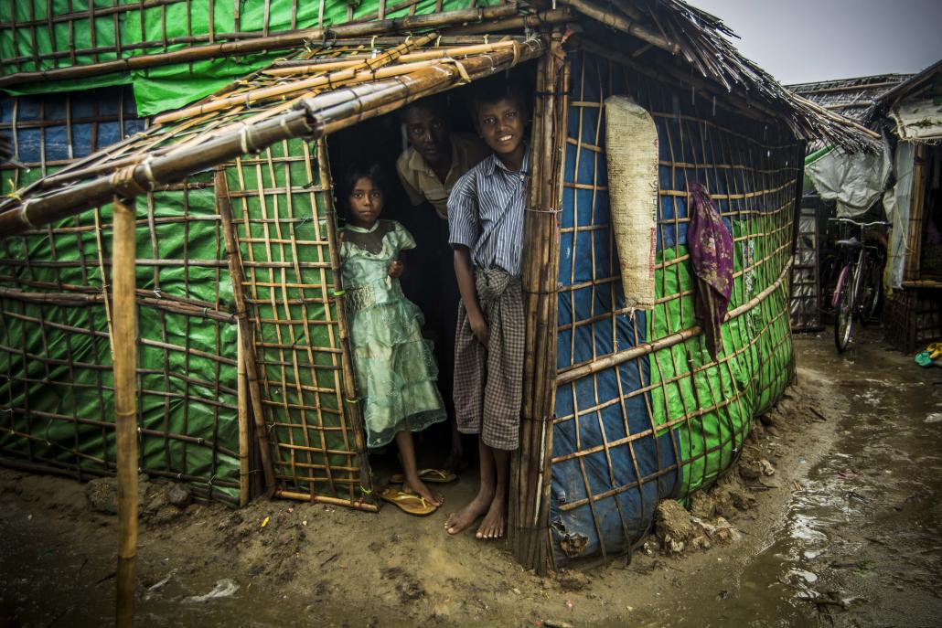 A family at a makeshift home at a Muslim IDP camp in Sittwe. (Maro Verli / Frontier)