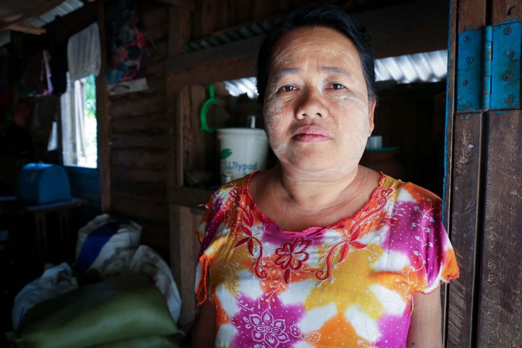 Daw Khin Hla, a 52-year old resident of Thingan Galay village, was saved because her long hair was caught in a tree after her house was swept away by the tide. (Victoria Milko | Frontier)