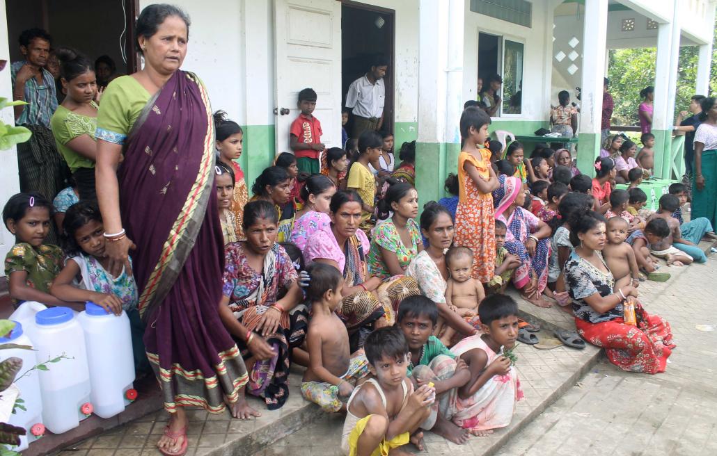 Hindu residents fleeing the violence sparked by the August 25 attacks took refuge at a makeshift IDP camp in Maungdaw town. (Nyan Hlaing Lynn | AFP)