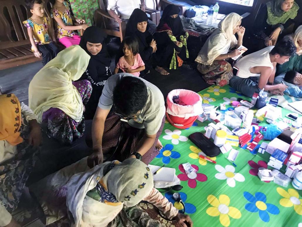 A mobile clinic visits a Rohingya village in northern Rakhine.