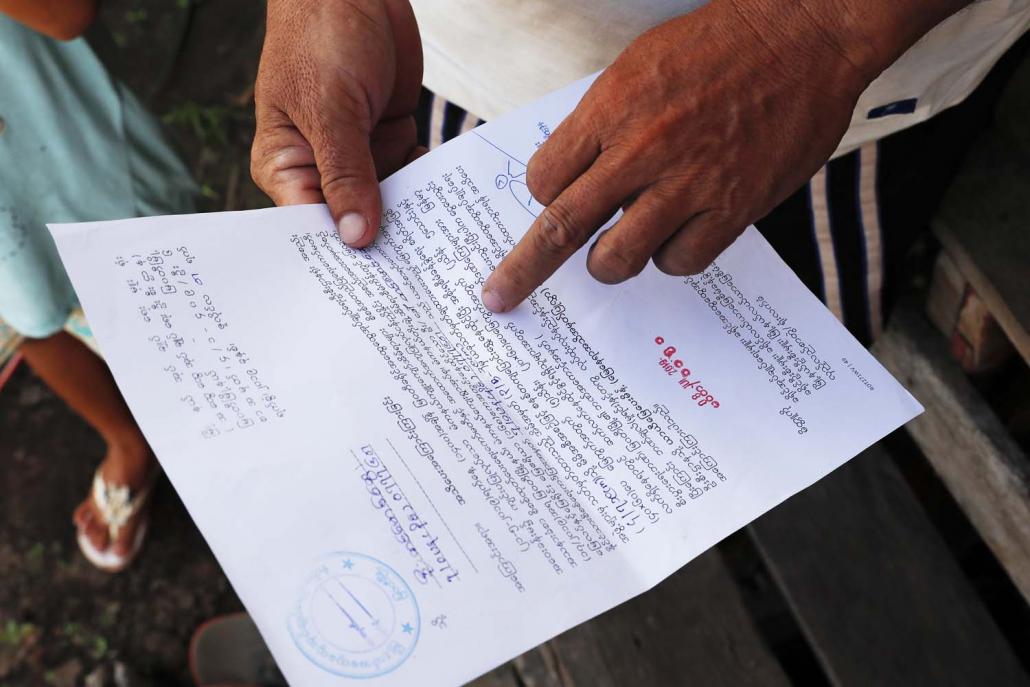 A letter from the Kayin State government showing the price for a plot of land sold to a resident relocated from Shwe Mya Sandi. (Nyein Su Wai Kyaw Soe | Frontier)