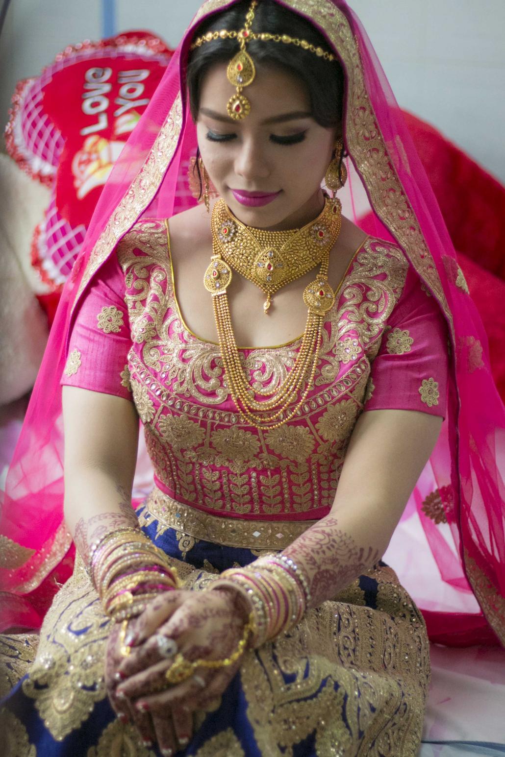 Bride Shilpa Pradhan, 23, is Gorkha-Buddhist but agreed to a Hindu-style wedding at the request of her husband's family. (Nyein Su Wai Kyaw Soe | Frontier)