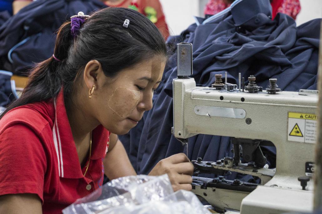 Workers at a garment factory in Hlaing Tharyar Industrial Zone, on the western outskirts of Yangon. (Nyein Su Wai Kyaw Soe | Frontier)