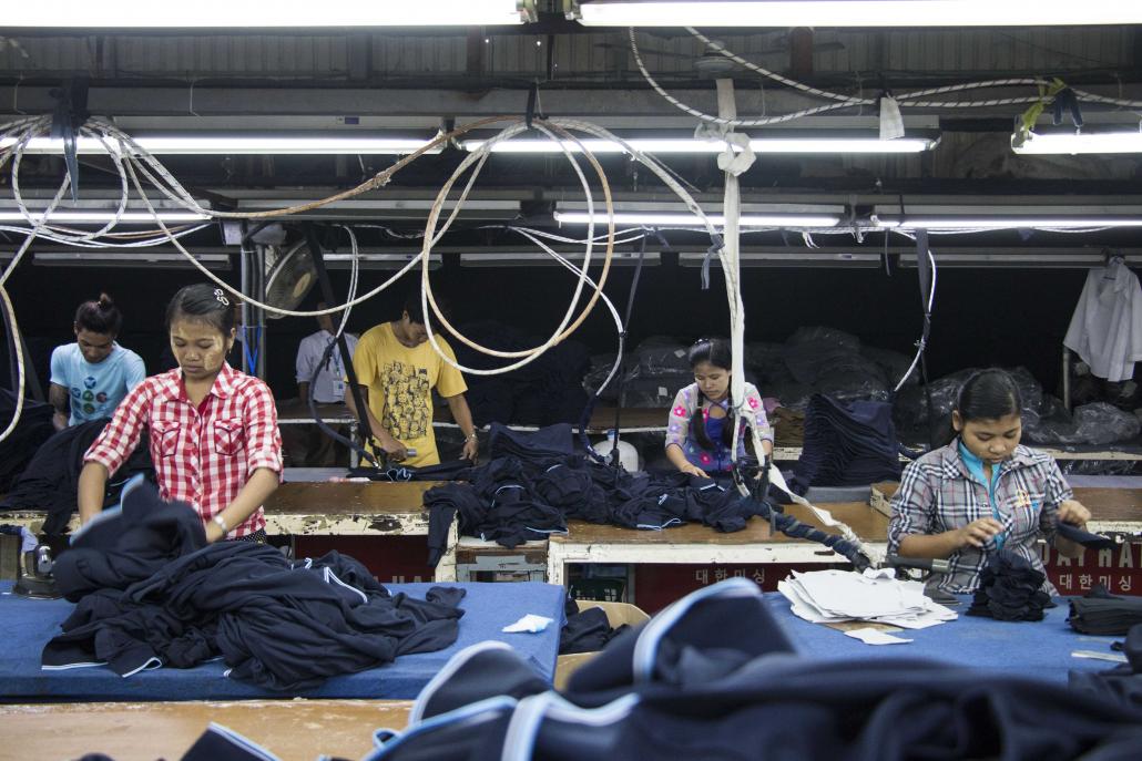 Women work at a garment factory in Hlaing Tharyar Township, Yangon. (Nyein Su Wai Kyaw Soe | Frontier)