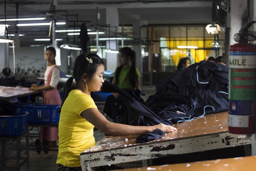 A worker at a garment factory in Hlaing Tharyar Industrial Zone, on the western outskirts of Yangon. (Nyein Su Wai Kyaw Soe | Frontier)