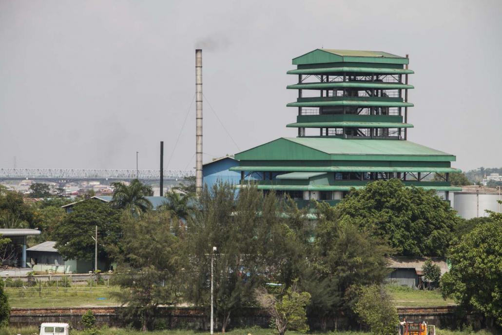 The Yuzana palm oil factory in Thaketa Township contravenes Environmental Conservation Department emissions standards but municipal authorities have refused to set a deadline for it to become compliant. (Nyein Su Wai Kyaw Soe | Frontier)