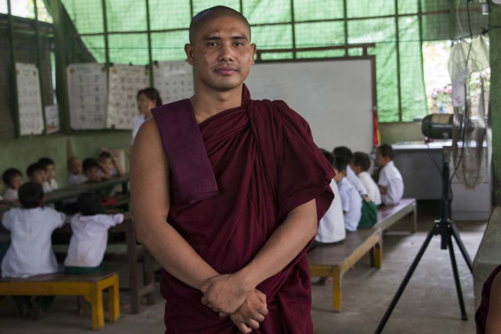 U Tate Sa, 28, began teaching at Aye Yeik Thar a year ago because he wanted to help children in the area who could not afford to attend a state school. (Nyein Su Wai Kyaw Soe | Frontier)