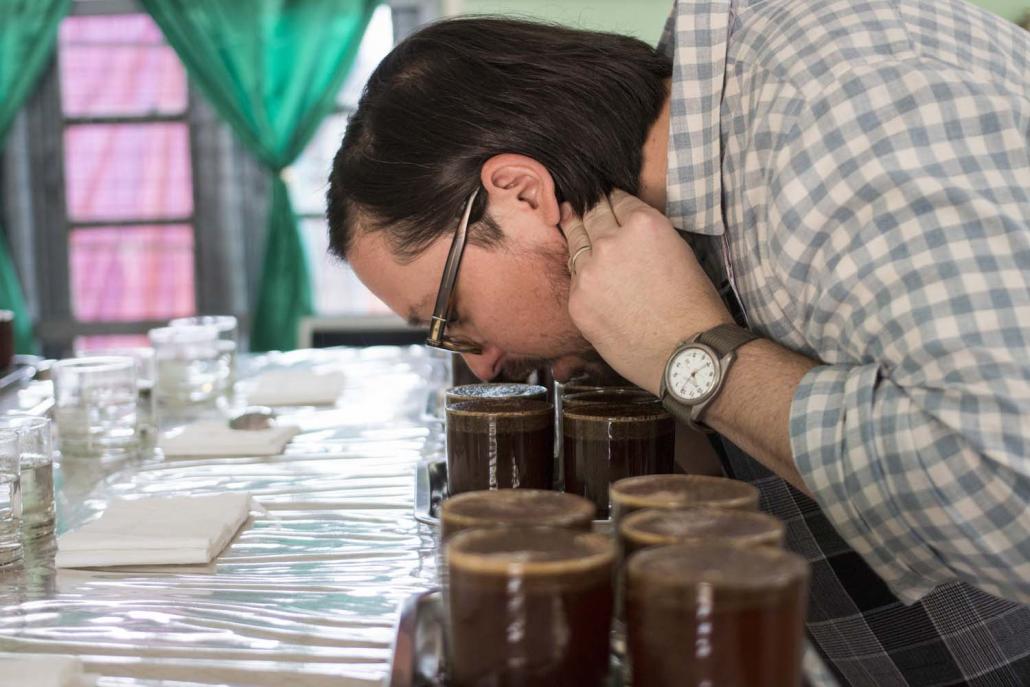 Judge Mr Matt Swenson, from Austin, Texas, tests samples (Nyein Su Wai Kyaw Soe | Frontier)