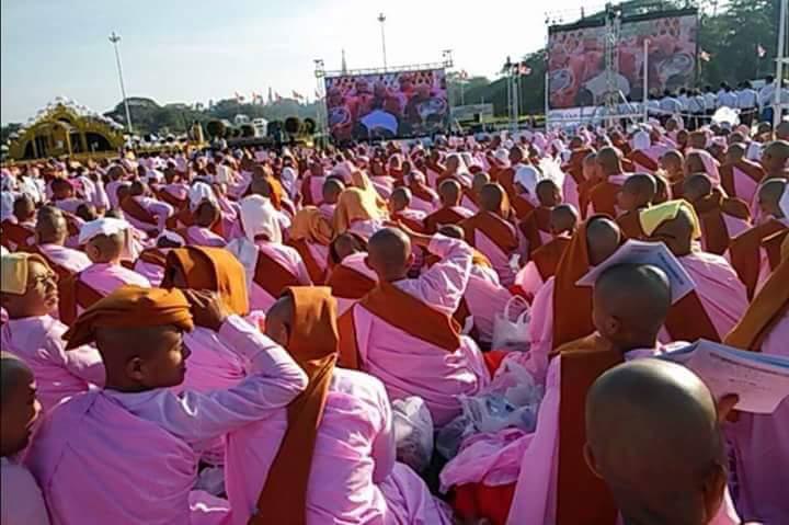 Nuns watch the Shwedagon ceremony from People's Park on January 1. (Sai Zaw | 7 Day)