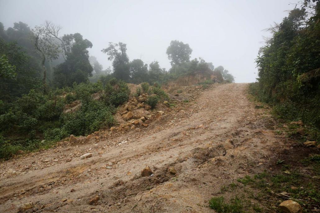 The mountain path near Oi Law village that leads to a narrow road where the gunfight took place. (Staff | Frontier)