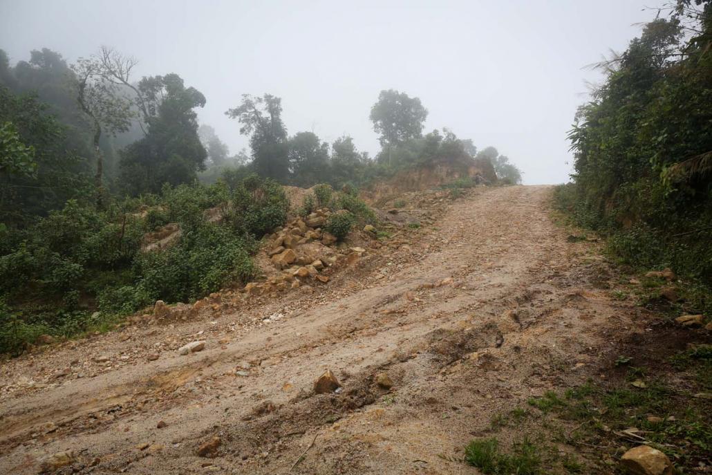 The mountain path near Oi Law village that leads to a narrow road where the gunfight took place. (Staff | Frontier)