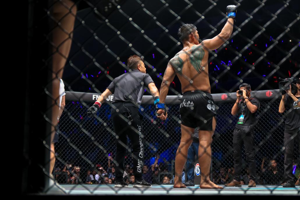 Aung La Nsang is announced the winner of Friday's fight. (Victoria Milko | Frontier)