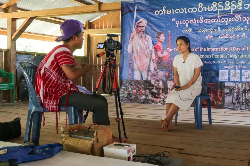 Research participant Hsa Yu is interviewed during the report launch. (Victoria Milko | Frontier)