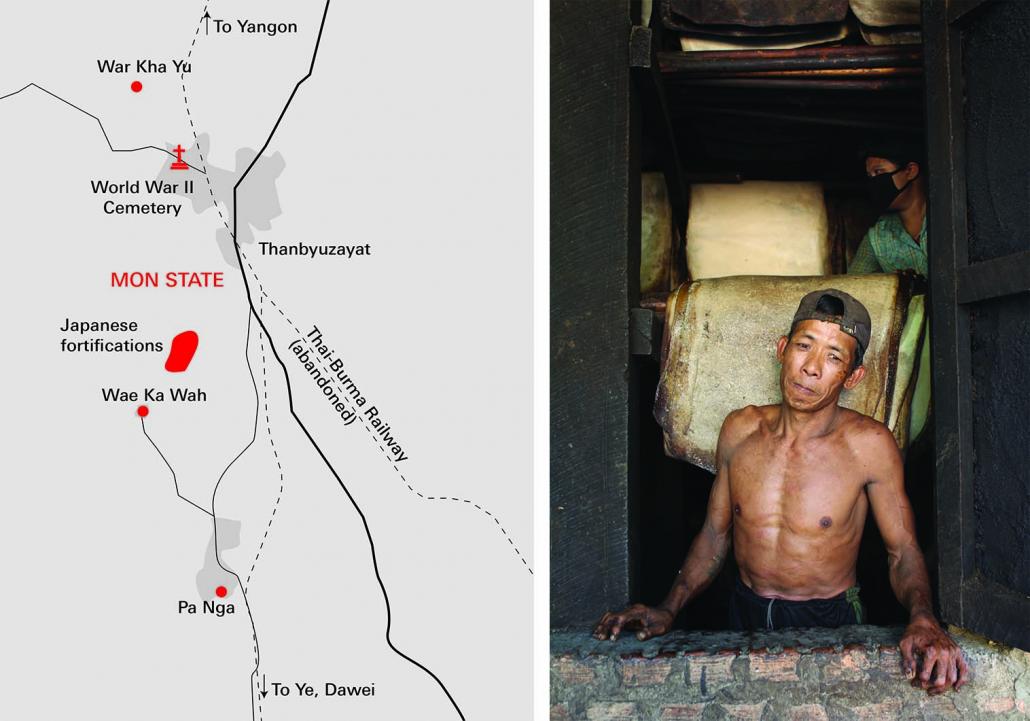 A man stands inside a building used to smoke rubber at the Yadanarbon factory in Thanbyuzayat. (Thomas Kean | Frontier)