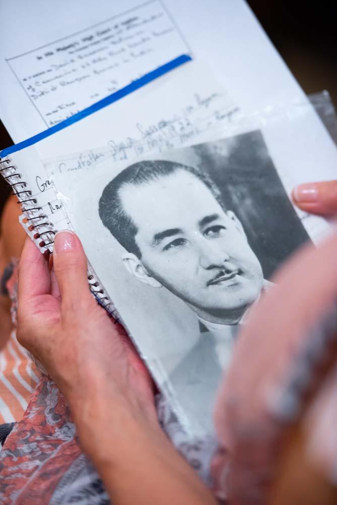 Ms Lorna Alexis Ward holds a photo of a relative – a member of the wealthy Sassoon Solomon family – who once lived in Yangon. (Rajiv Raman | Frontier)