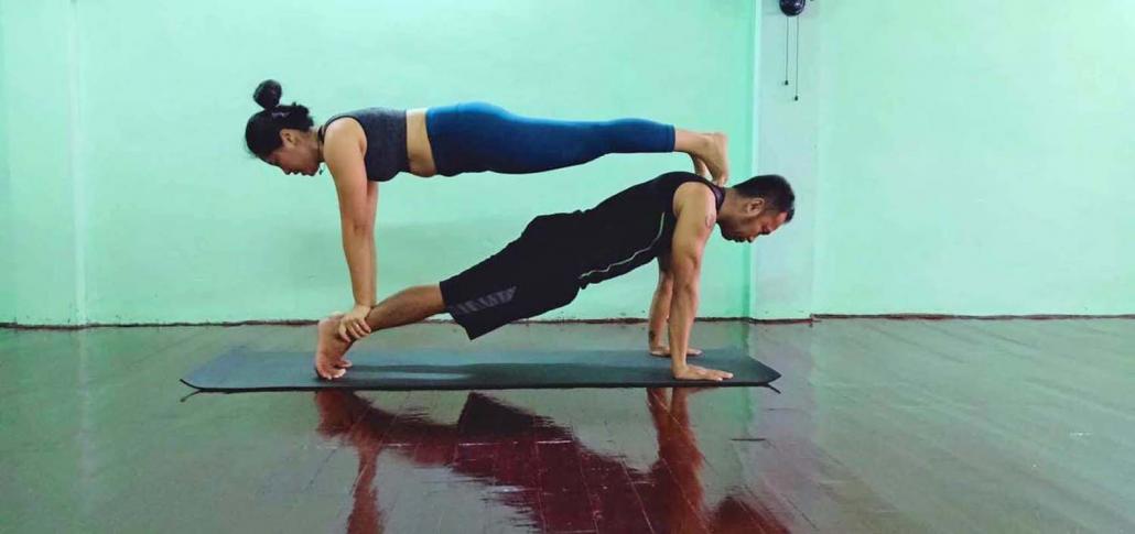 Husband-and-wife team U Thiha and Daw Zarchi run Thiha Yoga Class in Sanchaung Township. (Supplied)