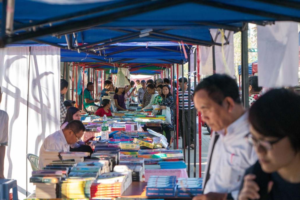 Sellers at Yangon Book Street hope for a more permanent venue to sell their books in. (Thuya Zaw | Frontier)