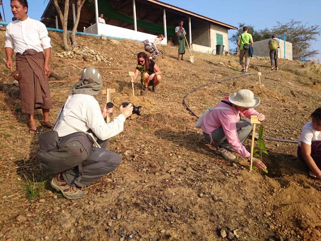 Visitors to Myaing Township are encouraged to help out with a community greening project. (Supplied)