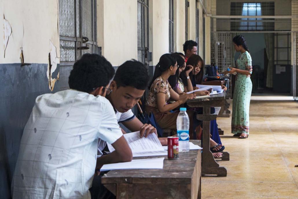 Students study after a lecture at Yangon University. Little information is made available to matriculation students about the contents of university courses prior to enrolling. (Thuya Zaw | Frontier)
