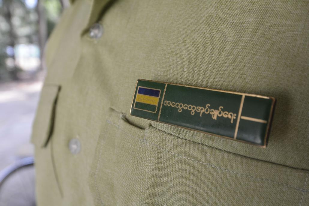 The badge of a civil servant working at the Eastern Yangon General Administration Department office in Thingangyun Township. (Teza Hlaing / Frontier)