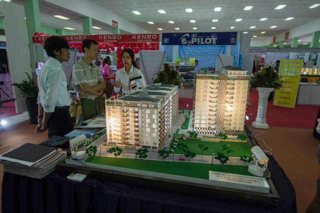 A model of Shine Construction’s Shwe Htan Pin Condominium in Kamaryut Township, where rooms start at more than K130 million. (Teza Hlaing / Frontier)