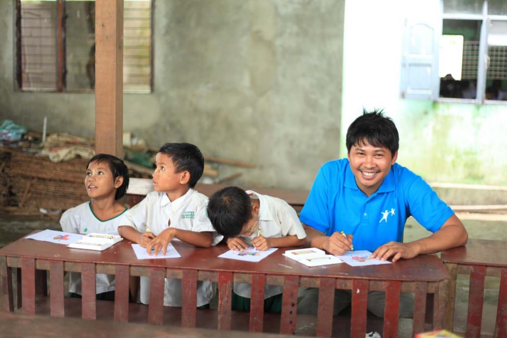 Journalist and author Ko Wa Lone at a donation ceremony for children. (Supplied)