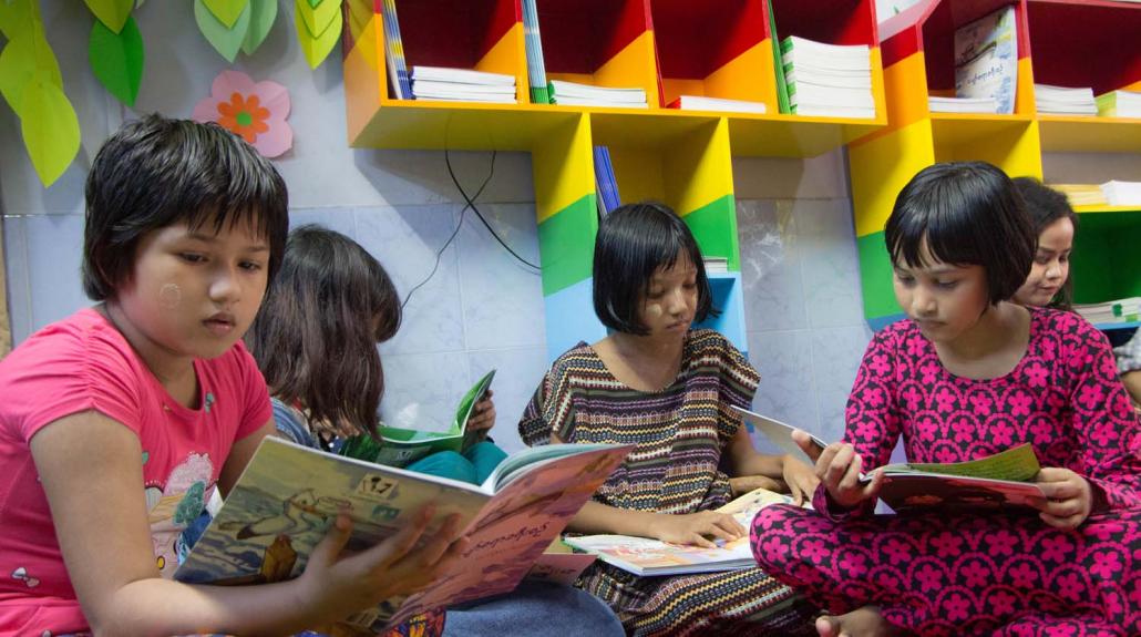 Neighbourhood kids at the Third Story salesroom in Yangon's Kyauktada Township. (Thuya Zaw | Frontier)