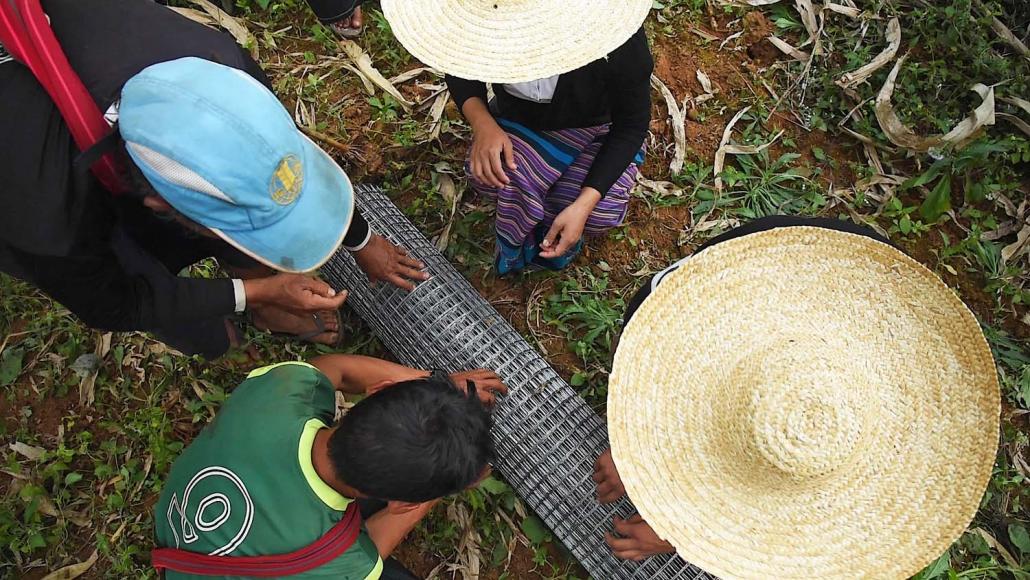 Coffee farmers take part in a Winrock training programme aimed at improving the quality of their product. (Rajiv Raman | Frontier)