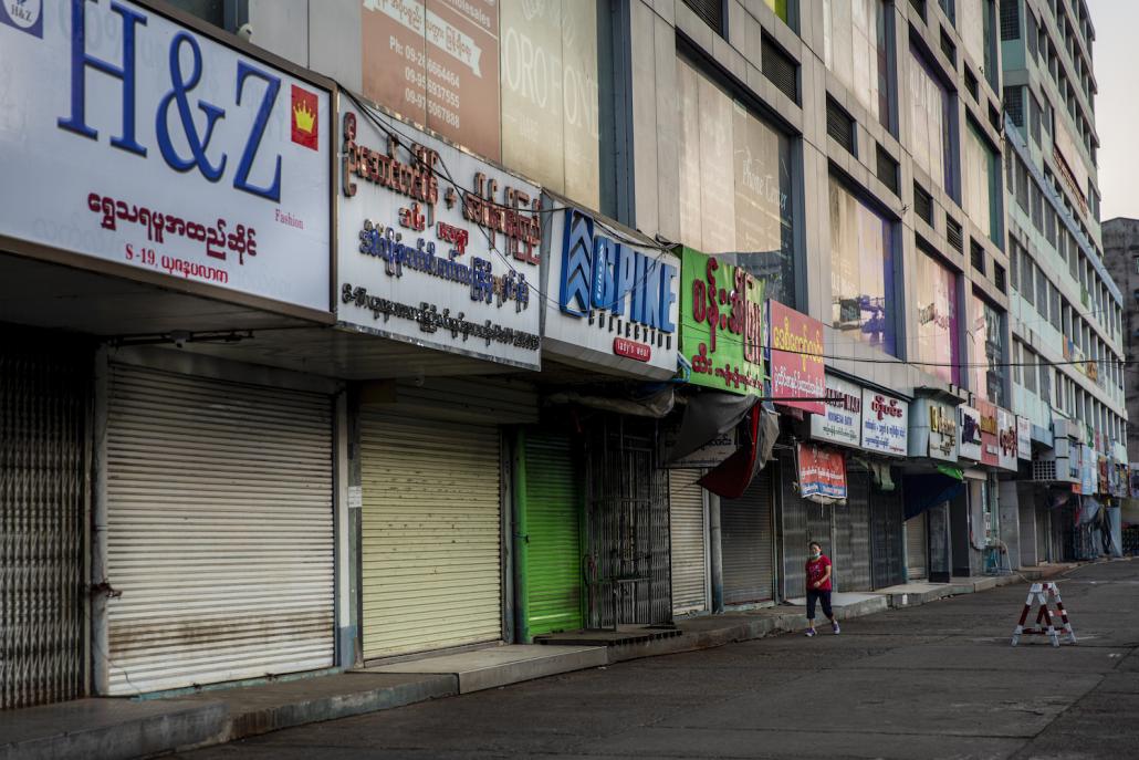 Shuttered stores at Yuzana Plaza, which is normally one of the busiest shopping centres in Yangon. (Hkun Lat | Frontier)