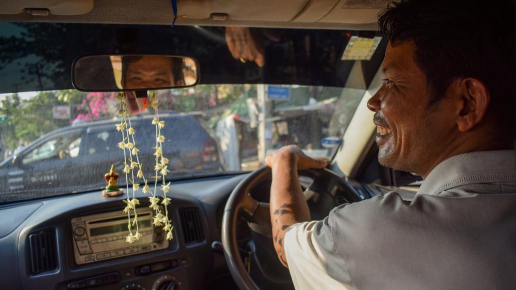 U Htun Kyaw, 47, a father of two, says he plans to stop renting his taxi because even with low fuel prices and a reduced rental fee, he is losing money every day he works. (Kyaw Lin Htoon | Frontier)