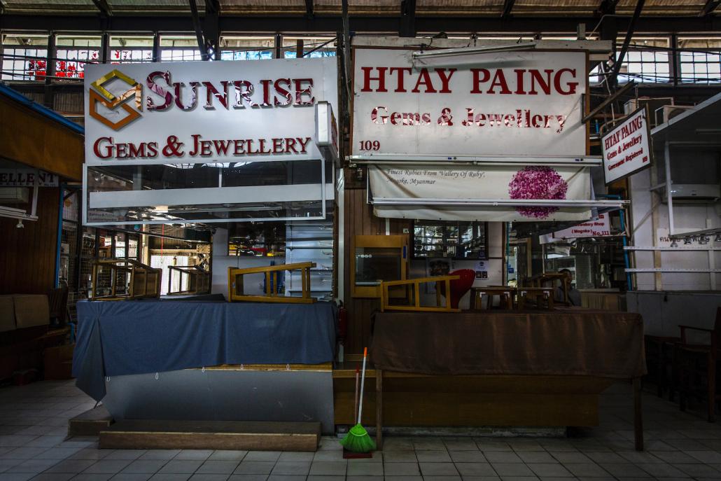 Shuttered gems and jewellery stores in Yangon's iconic Bogyoke Market. Businesses linked to the tourism industry have been hard-hit by the COVID-19 global pandemic. (Hkun Lat | Frontier)