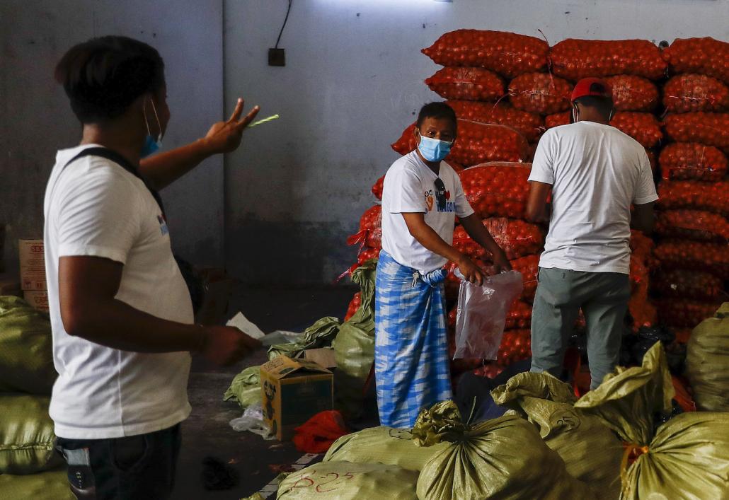 We Love Yangon plans to distribute packages of basic necessities to 100,000 people during the Thingyan holiday. (Nyein Su Wai Kyaw Soe | Frontier)