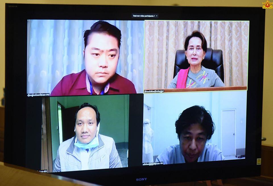 State Counsellor Daw Aung San Suu Kyi has a video call with three COVID-19 patients on April 28. (Myanmar State Counsellor Office Facebook)