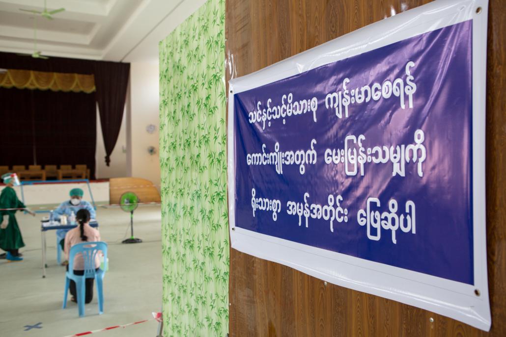 A sign in the Hlaing Tharyar fever clinic requests patients to "Please answer the truth for the sake of you and your family's health." (Thuya Zaw | Frontier)