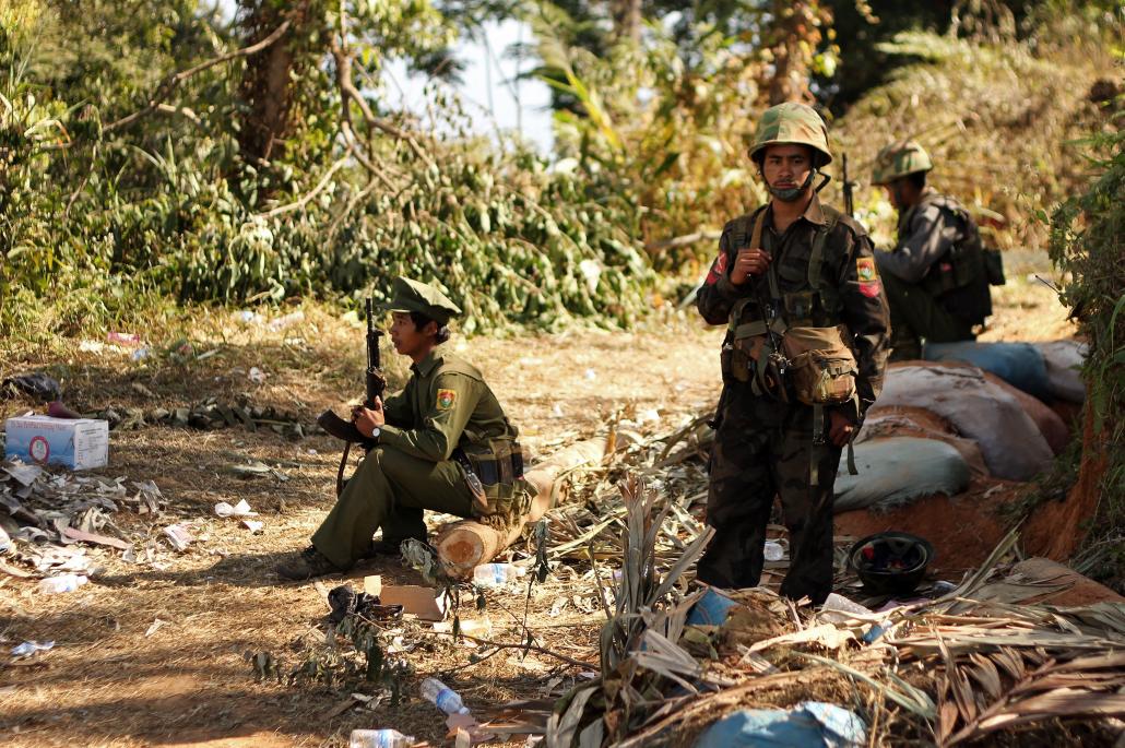 Kachin Independence Army soldiers stand guard as they secure an area on Hka Ya mountain in Kachin State on January 20, 2013. (AFP)