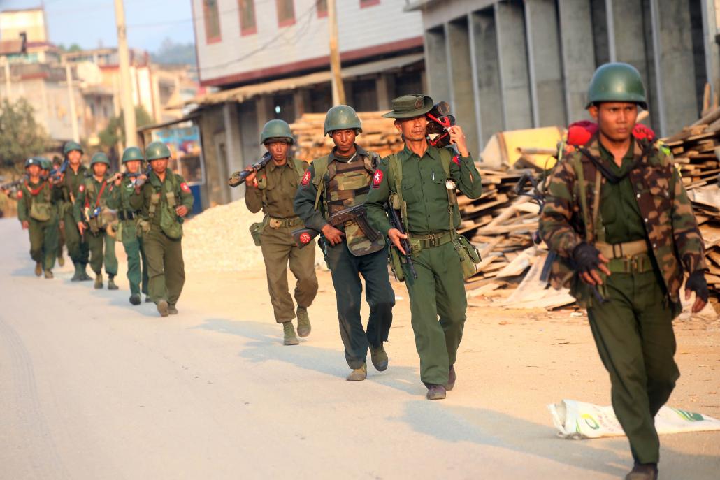 Tatmadaw soldiers patrol in Laukkai, the main city in the Kokang region, on February 16, 2015. (AFP)